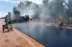 На мосту через реку Сакмару в Оренбурге начали укладывать асфальт