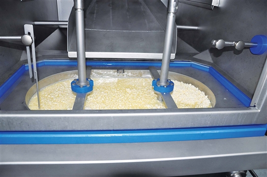 Процесс дозирования сырного зерна