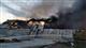 В Кинеле при помощи двух пожарных поездов тушат полыхающий ангар